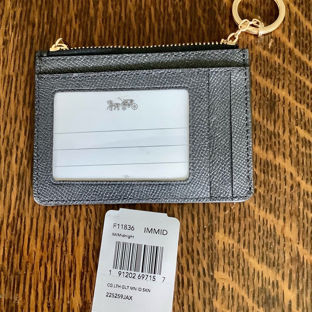 Coach card carrier.